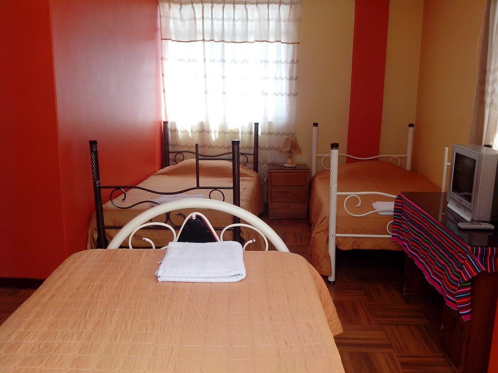 Totorani Inn Puno Chambre photo